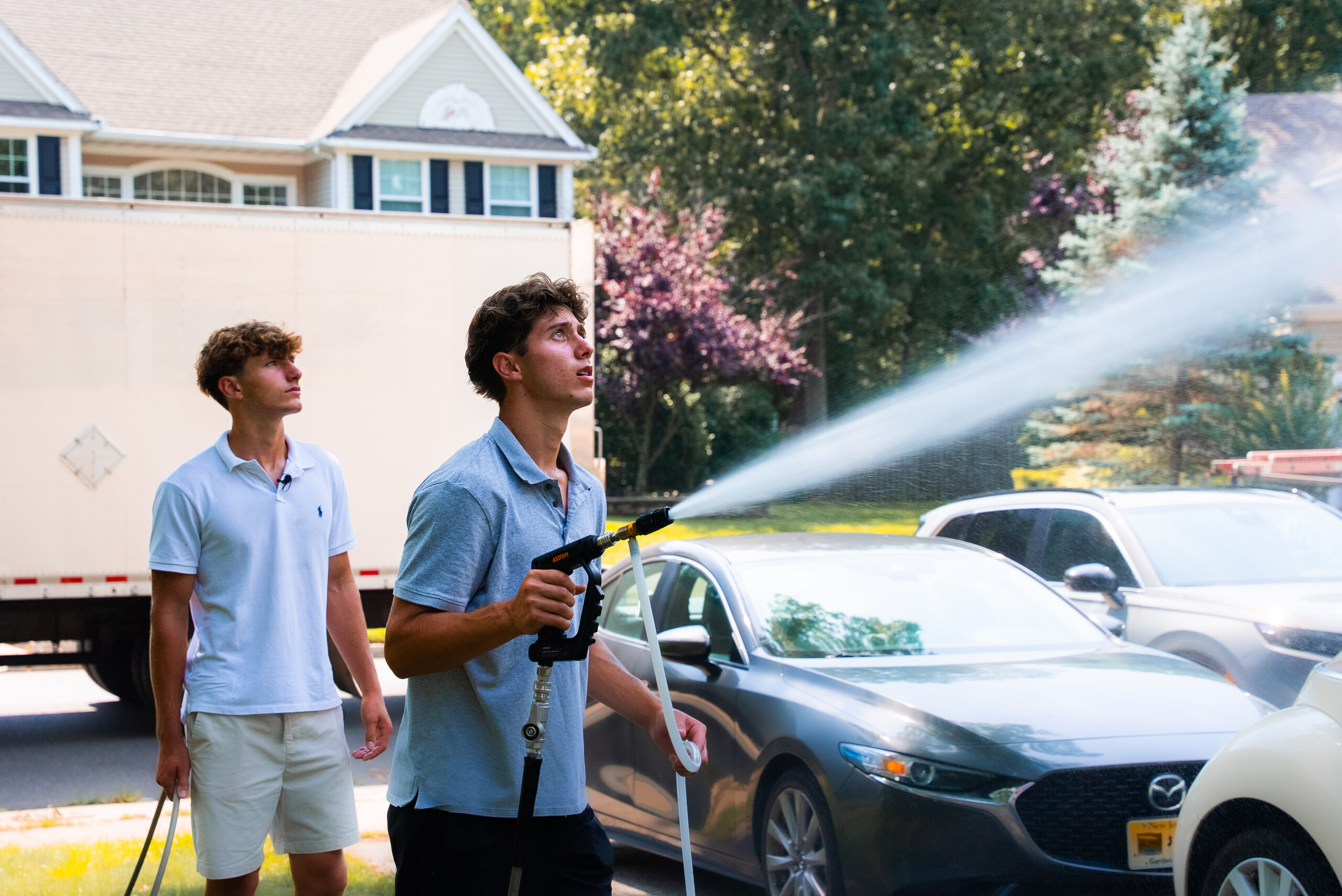 All Pro Exterior Cleaning crew soft washing a home in Ocean County NJ